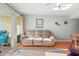 Relaxing living room featuring a comfortable couch and ocean view at 301 N Waccamaw Dr. # 206, Murrells Inlet, SC 29576