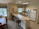 Well-equipped kitchen featuring ample cabinetry and a breakfast bar at 4893 Magnolia Pointe Ln. # 305, Myrtle Beach, SC 29577
