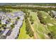 Aerial view of community featuring golf course and resort-style living at 4893 Magnolia Pointe Ln. # 305, Myrtle Beach, SC 29577