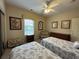 Spacious bedroom with two twin beds and a sitting area at 4893 Magnolia Pointe Ln. # 305, Myrtle Beach, SC 29577