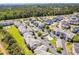 Aerial view of community with pool and ocean view at 4893 Magnolia Pointe Ln. # 305, Myrtle Beach, SC 29577