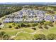 Wide aerial view of community and golf course at 4893 Magnolia Pointe Ln. # 305, Myrtle Beach, SC 29577