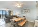 Coastal dining area with a rustic wooden table at 1625 S Ocean Blvd. # 1002, North Myrtle Beach, SC 29582