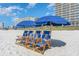 Beachfront property with chairs and umbrellas at 1625 S Ocean Blvd. # 1002, North Myrtle Beach, SC 29582