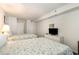 Bedroom with two twin beds and white wicker furniture at 1625 S Ocean Blvd. # 1002, North Myrtle Beach, SC 29582