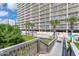 Building exterior showcasing pool and landscaping at 1625 S Ocean Blvd. # 1002, North Myrtle Beach, SC 29582