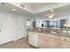 Open kitchen with granite counters and white cabinets at 1625 S Ocean Blvd. # 1002, North Myrtle Beach, SC 29582