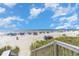 Scenic beach access with boardwalk and beach chairs at 1625 S Ocean Blvd. # 1002, North Myrtle Beach, SC 29582