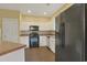 Modern kitchen featuring black appliances and granite counters at 332 Sebastian Dr., Myrtle Beach, SC 29588