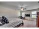Spacious main bedroom with king bed, TV, and carpeted floor at 190 Campania St., Myrtle Beach, SC 29579