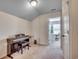 Small office space with a piano and access to another room at 190 Campania St., Myrtle Beach, SC 29579