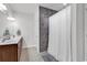 Bathroom with double vanity and a large walk-in shower at 190 Campania St., Myrtle Beach, SC 29579