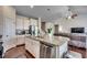 Open concept kitchen with large island, stainless steel appliances, and hardwood floors at 190 Campania St., Myrtle Beach, SC 29579