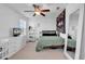 Spacious bedroom with a queen bed, dresser, and full-length mirror at 190 Campania St., Myrtle Beach, SC 29579