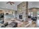 Community room features a large stone fireplace, comfortable seating, and kitchenette at 190 Campania St., Myrtle Beach, SC 29579