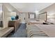 Two beds, dresser, and carpet in a condo bedroom at 1105 S Ocean Blvd. # 106, Myrtle Beach, SC 29577
