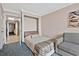Small bedroom with a double bed and access to another room at 1105 S Ocean Blvd. # 106, Myrtle Beach, SC 29577