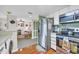 Efficient kitchen with stainless steel appliances and wood flooring at 310 73Rd Ave. N # 5-C, Myrtle Beach, SC 29572