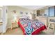 Cozy bedroom featuring a patchwork quilt and wicker furniture at 310 73Rd Ave. N # 5-C, Myrtle Beach, SC 29572