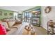 Living Room with ocean view, fireplace, and comfortable seating at 310 73Rd Ave. N # 5-C, Myrtle Beach, SC 29572