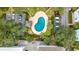 Aerial view of community pool, parking, and landscaping at 310 73Rd Ave. N # 5-C, Myrtle Beach, SC 29572