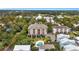 Aerial view of condo building with pool, close to other homes and businesses at 310 73Rd Ave. N # 5-C, Myrtle Beach, SC 29572