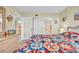 Bright bedroom with a view of the bathroom and access to the hallway at 310 73Rd Ave. N # 5-C, Myrtle Beach, SC 29572