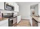 Modern kitchen with stainless steel appliances and granite countertops at 438 Archer Ct., Conway, SC 29526