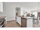Open concept kitchen with island and granite countertops at 438 Archer Ct., Conway, SC 29526