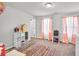 A spacious playroom featuring a cheerful decor and large windows at 438 Archer Ct., Conway, SC 29526