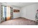 A comfortable bedroom with neutral walls and large window at 438 Archer Ct., Conway, SC 29526