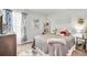 Cozy bedroom with a gray comforter, decorative wall art and window curtains at 438 Archer Ct., Conway, SC 29526