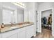 Double vanity bathroom with granite countertop and walk-in closet at 438 Archer Ct., Conway, SC 29526