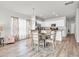 Casual dining area with glass-top table and four chairs at 438 Archer Ct., Conway, SC 29526