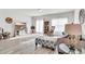 Bright living room, featuring a sectional sofa and a large TV at 438 Archer Ct., Conway, SC 29526
