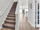 A view of a carpeted staircase leading to the upper level of the home at 438 Archer Ct., Conway, SC 29526