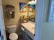 Small condo bathroom with updated vanity and mirror at 201 74Th Ave. N # 1134, Myrtle Beach, SC 29572