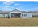 Covered screened porch with patio, perfect for relaxing outdoors at 7274 Sarteano Dr., Myrtle Beach, SC 29572