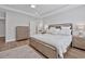 Main bedroom with wood platform bed, dresser and nightstands at 7274 Sarteano Dr., Myrtle Beach, SC 29572