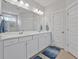 Double vanity bathroom with white cabinets and quartz countertop at 7274 Sarteano Dr., Myrtle Beach, SC 29572