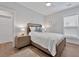 Bedroom with wood floors and ceiling fan at 7274 Sarteano Dr., Myrtle Beach, SC 29572