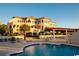 Resort-style pool with lounge chairs and umbrellas at 7274 Sarteano Dr., Myrtle Beach, SC 29572