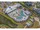 Community pool with surrounding lounge areas and a fire pit at 7274 Sarteano Dr., Myrtle Beach, SC 29572