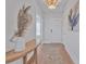 Bright entryway with hardwood floors and stylish decor at 7274 Sarteano Dr., Myrtle Beach, SC 29572