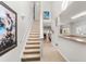 Elegant staircase leading to the second floor at 493 Shellbank Dr. # 2-B, Longs, SC 29568
