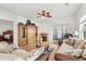 Spacious living room with hardwood floors and fireplace at 493 Shellbank Dr. # 2-B, Longs, SC 29568
