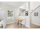 Cozy kitchen nook with a small table and chairs near a window at 493 Shellbank Dr. # 2-B, Longs, SC 29568