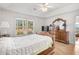 Spacious bedroom with hardwood floors and large window at 493 Shellbank Dr. # 2-B, Longs, SC 29568