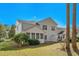 Townhouse backyard with screened porch and small lawn at 493 Shellbank Dr. # 2-B, Longs, SC 29568