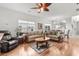 Relaxing living room with hardwood floors and comfy seating at 493 Shellbank Dr. # 2-B, Longs, SC 29568